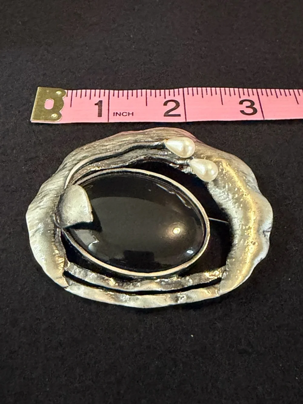 Vintage Artisan Silver-Tone Brooch with Black Cabochon and Pearl Accents